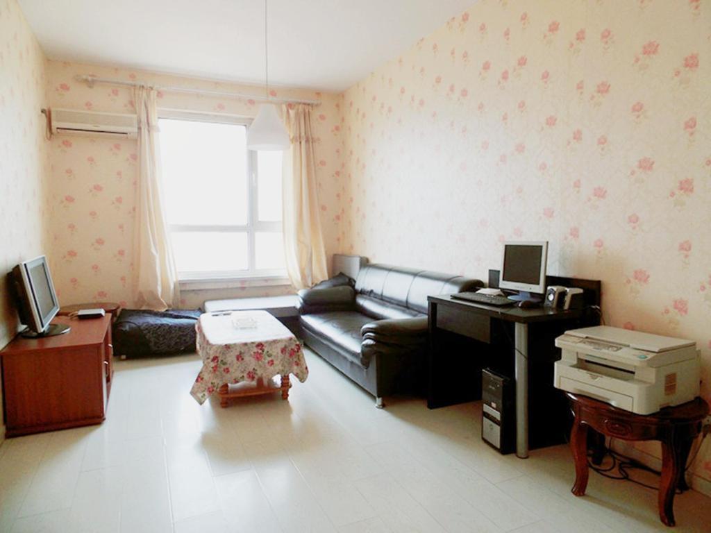 Xinghai Zhilian Apartment Далянь Номер фото